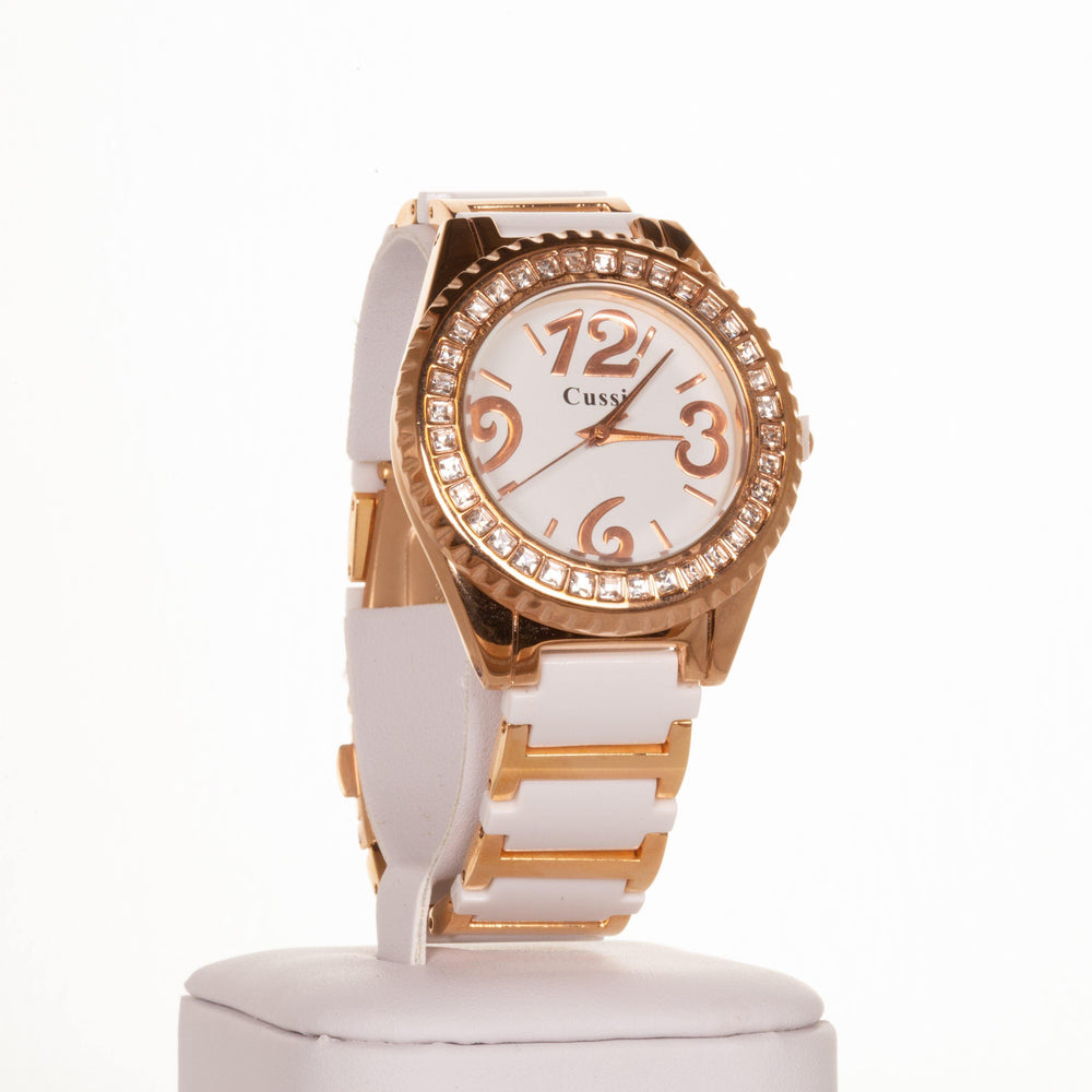 CUSSI dámské hodinky v barvě růžového zlata  s bílým řemínkem a krystaly křemene kolem ciferníku - Multilady.cz